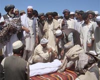 Afghan officials investigate reports 40 civilians killed in airstrike