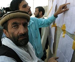Intimidation and fraud claims cast shadow over Afghan poll