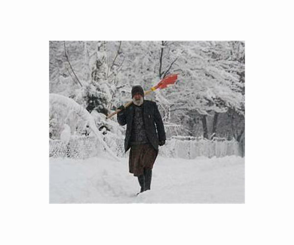 Afghan flights delayed as snow blankets Kabul airport