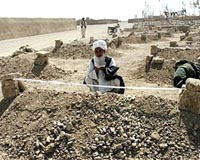 Afghan elder offers to open graves to prove civilian deaths