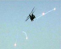 NATO's Afghan force short of helicopters, troops