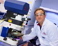 Breaking the rules: Heavy chemical elements alter theory of quantum mechanics