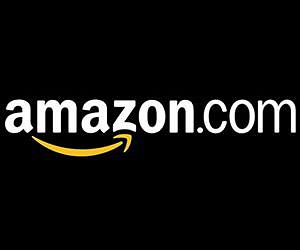 Amazon swings to loss but revenues rise