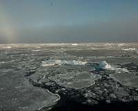 As climate stirs Arctic sea ice faster, pollution tags along