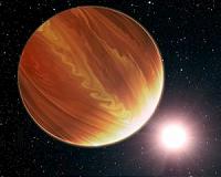Hubble Finds Three Surprisingly Dry Exoplanets