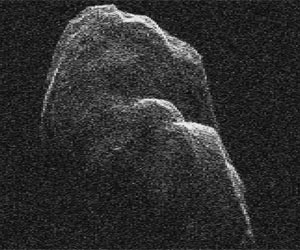 Asteroid Toutatis Slowly Tumbles by Earth