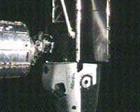 Shuttle Atlantis docks with Space Station