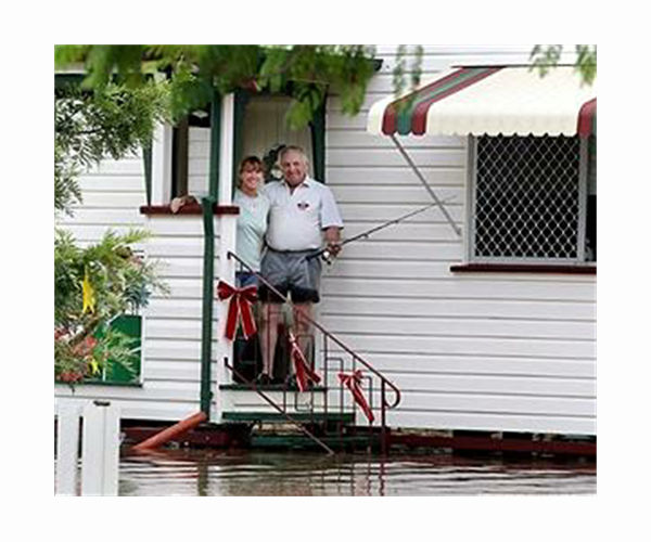 Flood victims stranded on roofs as downpours lash eastern Australia