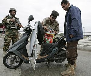 Five killed in attacks as Baghdad bans motorcycles