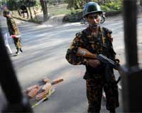 Bangladesh deploys troops to hunt mutineers: officials