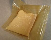Active, biodegradable packaging for oily products