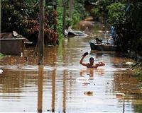 Brazil says floods driving thousands from homes