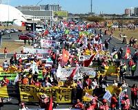 Virus lockdowns scale back May Day rallies