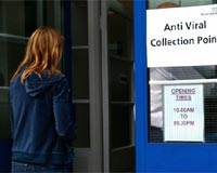 Britain starts swine flu jabs, as Europe watches