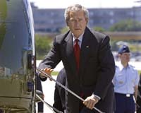 Bush takes distance from key Iran findings