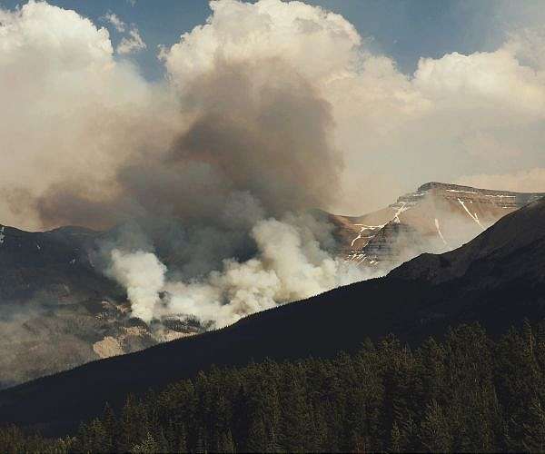 Early forest fires prompt evacuations in Canada