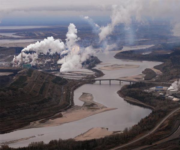 Canada opposition chief calls climate change 'real'; party says no