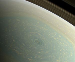 Spacecraft returns dramatic images of massive hurricane on Saturn