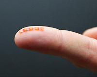 Natural scale caterpillar soft robot is powered and controlled with light