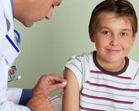 As kids' swine flu deaths spike, vaccine reaches public