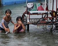 Flood misery in Philippines after typhoon kills 22