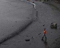 US firm ordered to pay more over China oil spill: court