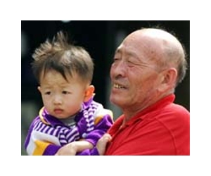 China eases one-child policy, abolishes labour camps