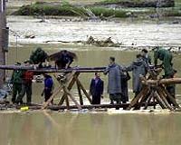 14 more die in China as rains refuse to let up
