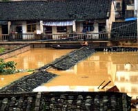 Ancient town under water as downpours hit central China