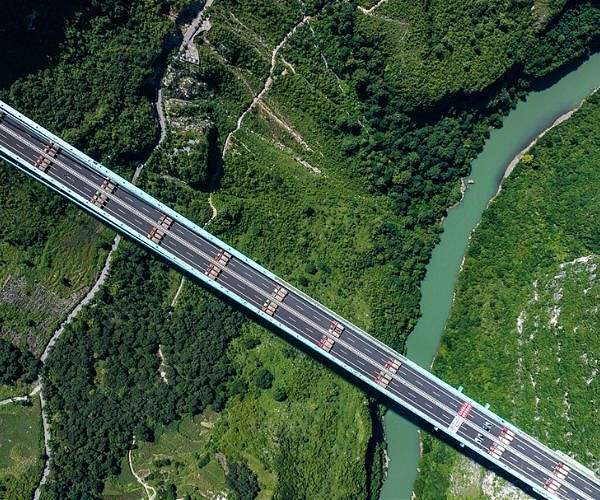 World's highest bridge opens to traffic in China