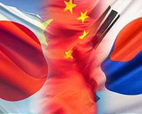 S. Korea, China, Japan put hostility aside at rare summit