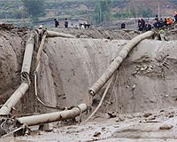 China landslide death toll raised to 254: state media