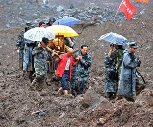 China rain, landslides leave 28 dead, 66 missing