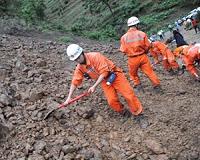 China landslide leaves ten dead, at least 12 missing