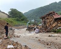 N.Korea says floods damaged tens of thousands of buildings