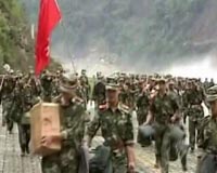 China cracks through damaged road to quake epicentre: report
