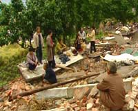 10,000 children and elderly left alone by quake: state media
