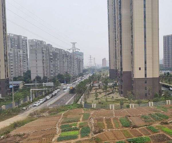China to almost double support for unfinished housing projects