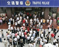 Calm returns to southern Chinese city after anti-police riot