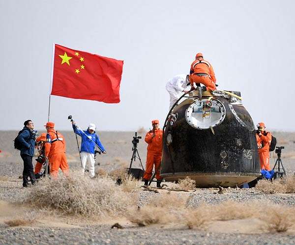 Three Chinese astronauts return to Earth after six months in space