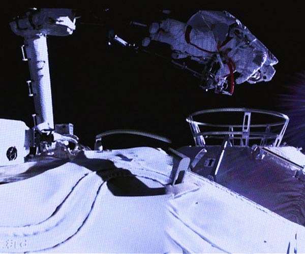 Astronauts complete first spacewalk at China's new Tiangong station