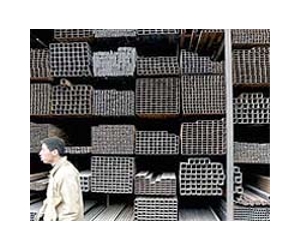 ArcelorMittal reports plungs into loss on weak Chinese demand for steel