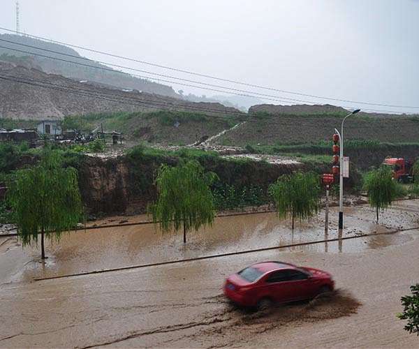 14 dead in north China rains