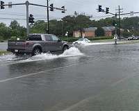 Bedraggled, displaced long to return home; death toll at 23 in Carolinas