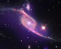 Galaxy Collision Switches On Black Hole
