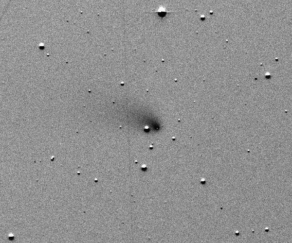 Curious comet's rare close approach