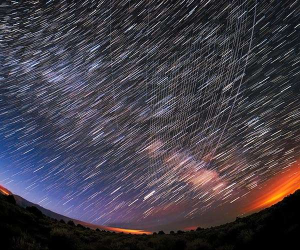 Protecting dark and quiet skies from satellite constellation interference