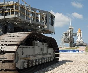 Slow-Motion Giants Carry Shuttles To Pad
