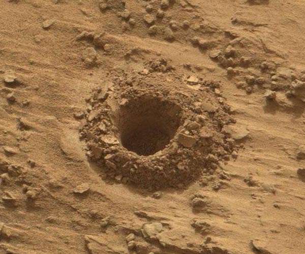 Digging into our new drill hole: Sols 3517-3518
