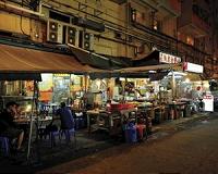 Hong Kong street stalls hang on under the skyscrapers